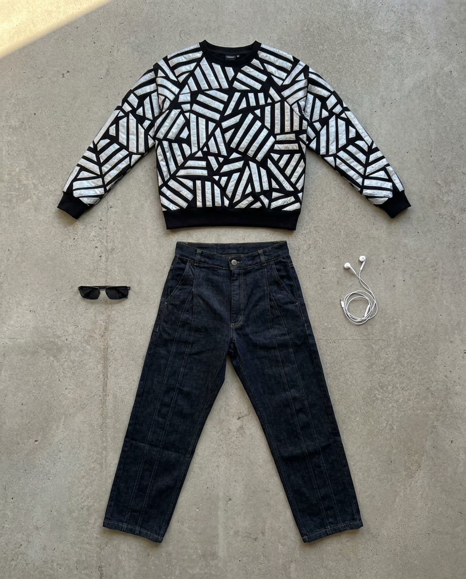 Dark indigo jean. Black knit. — outfit flat-lay