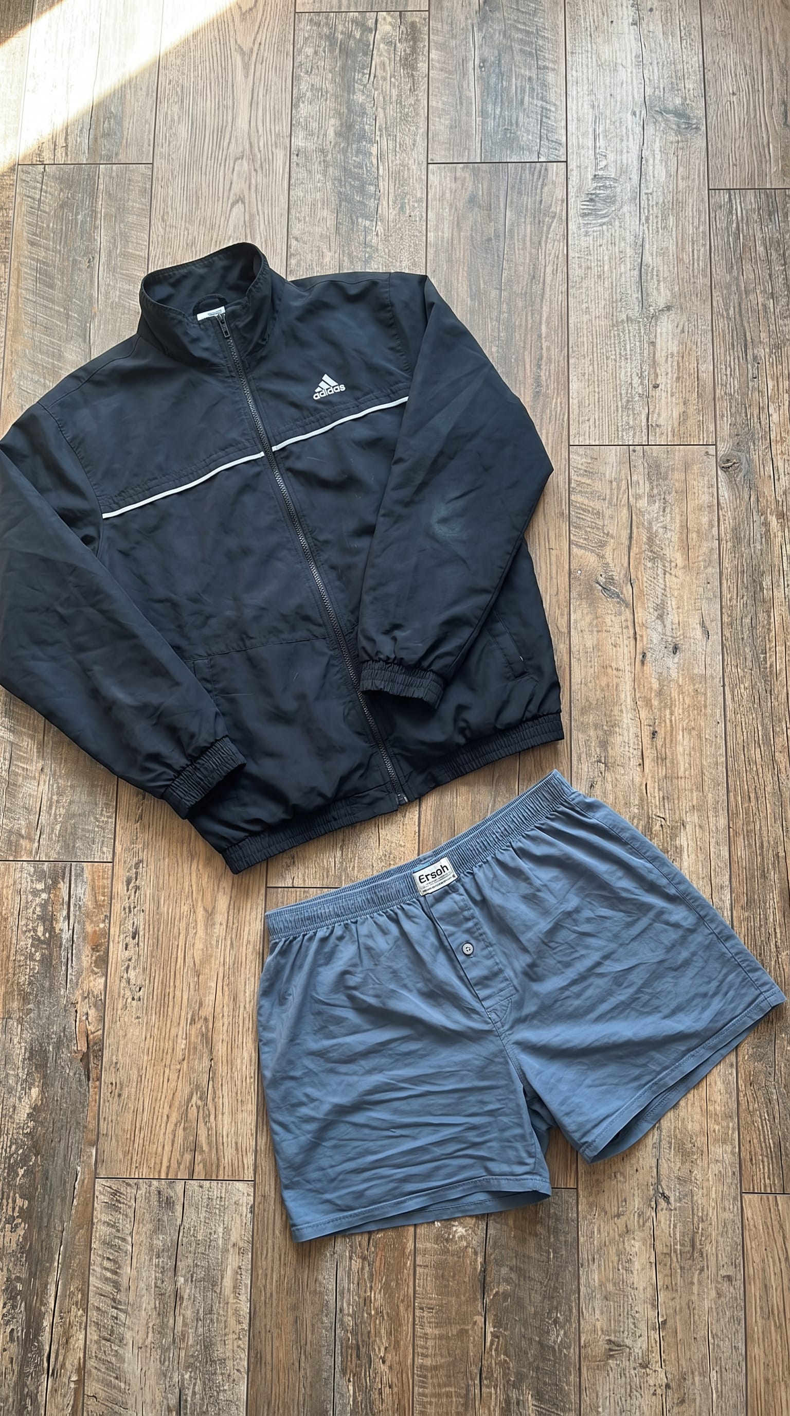 Black Jacket and Shorts Outfit Men flat-lay