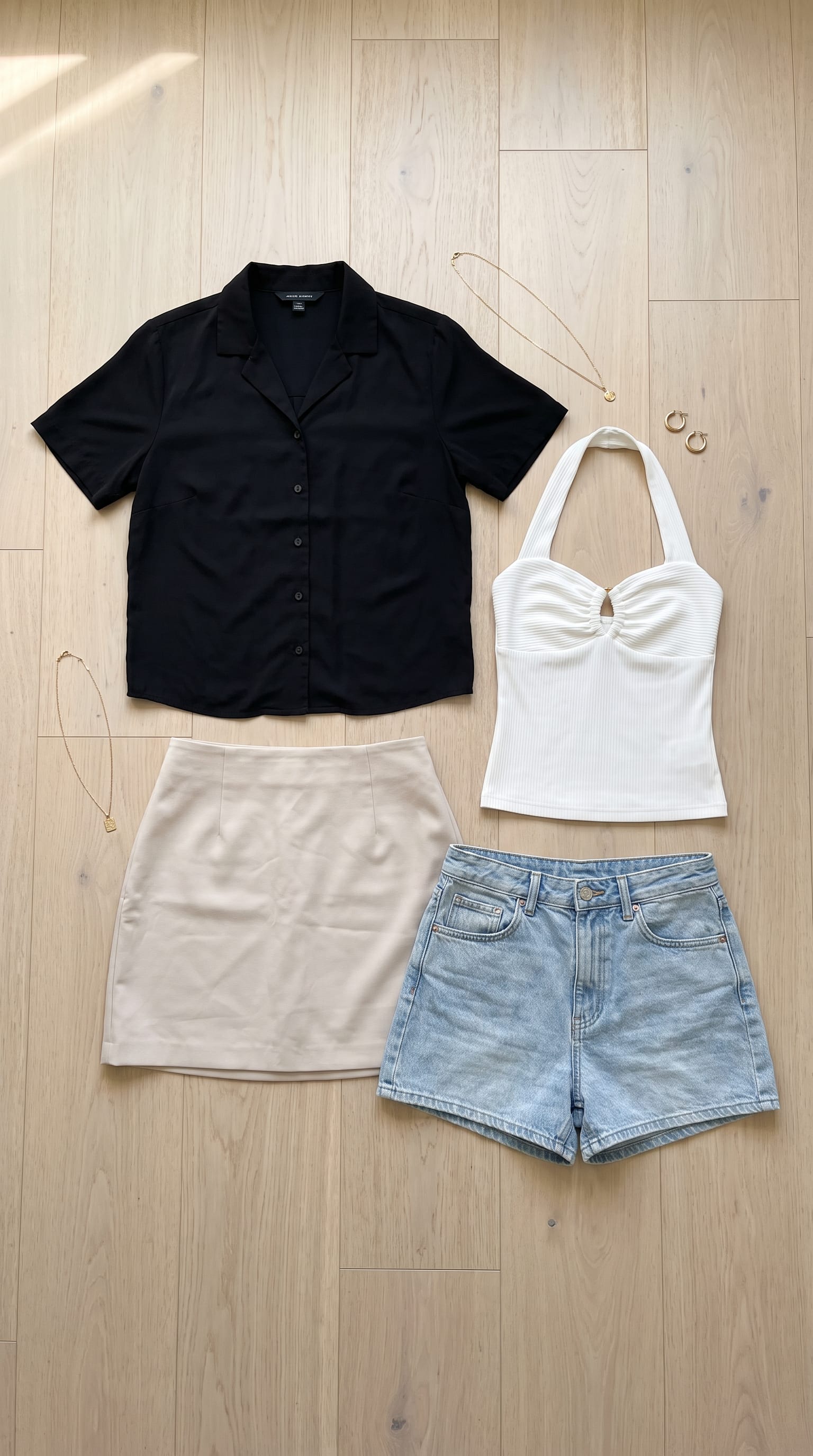 Black shirt. Light blue short. — outfit flat-lay