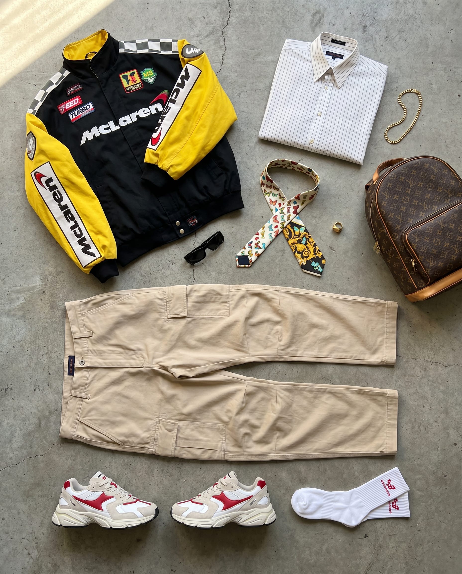 Black Jacket and Khaki Trousers Outfit Men flat-lay