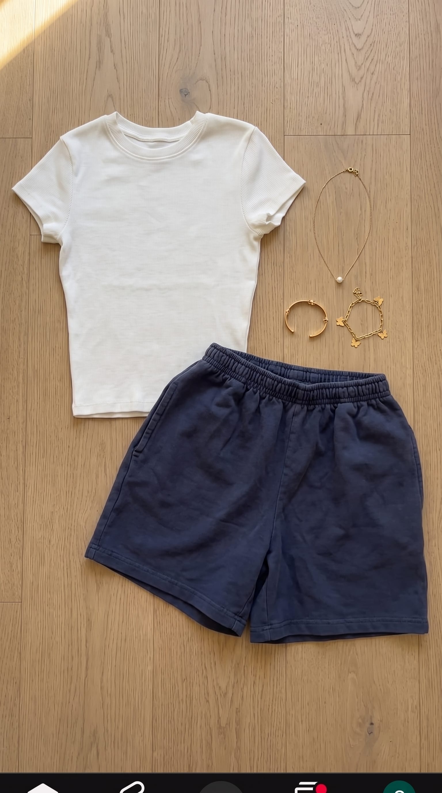 White Tee and Navy Shorts Outfit Women flat-lay