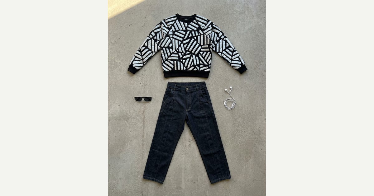 Dark indigo jean. Black knit. — outfit flat-lay