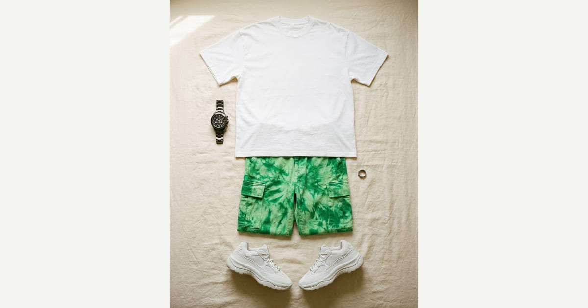 White tee. Bright green short. flat-lay