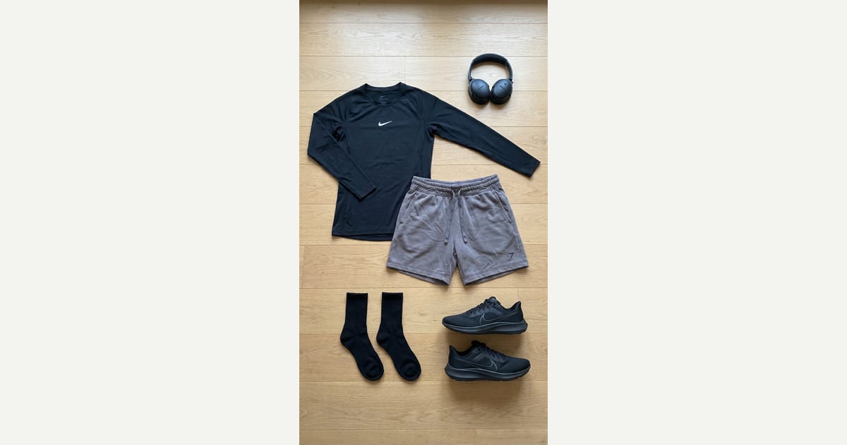 Black shirt. Grey short. — outfit flat-lay