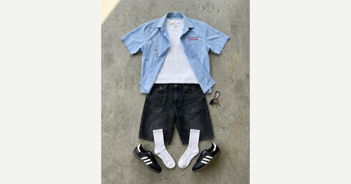 Light blue shirt. Black sneaker. flat-lay
